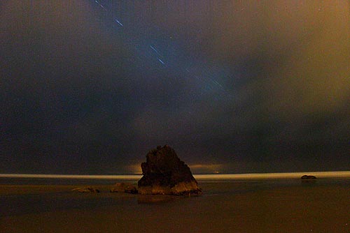 Surreal scene of Cannon Beach at night