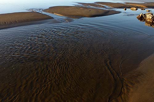 Arch Cape. high and low spots like this lurk beneath the waves