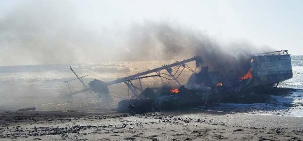 Fiery S. Oregon Coast Shipwreck Under Cleanup Efforts Now