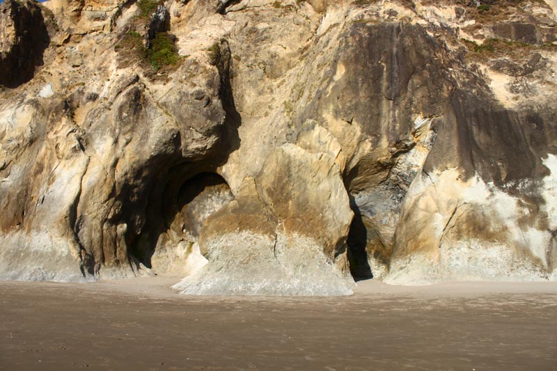 Fascinating rock cave-like holes at Hug Point