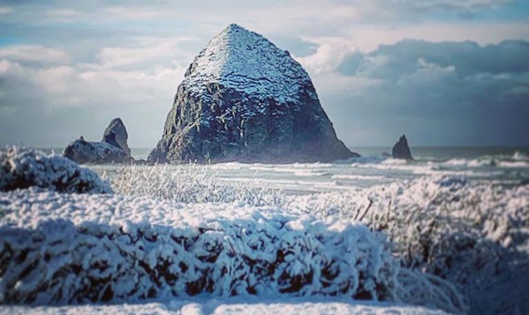 Cannon Beach Haystack Rock in snow